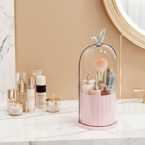 organisateur maquillage rotatif rose tendre