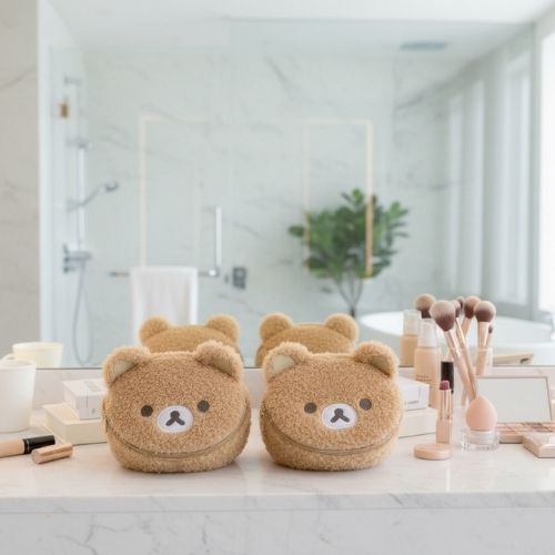 deux trousse maquillage peluches